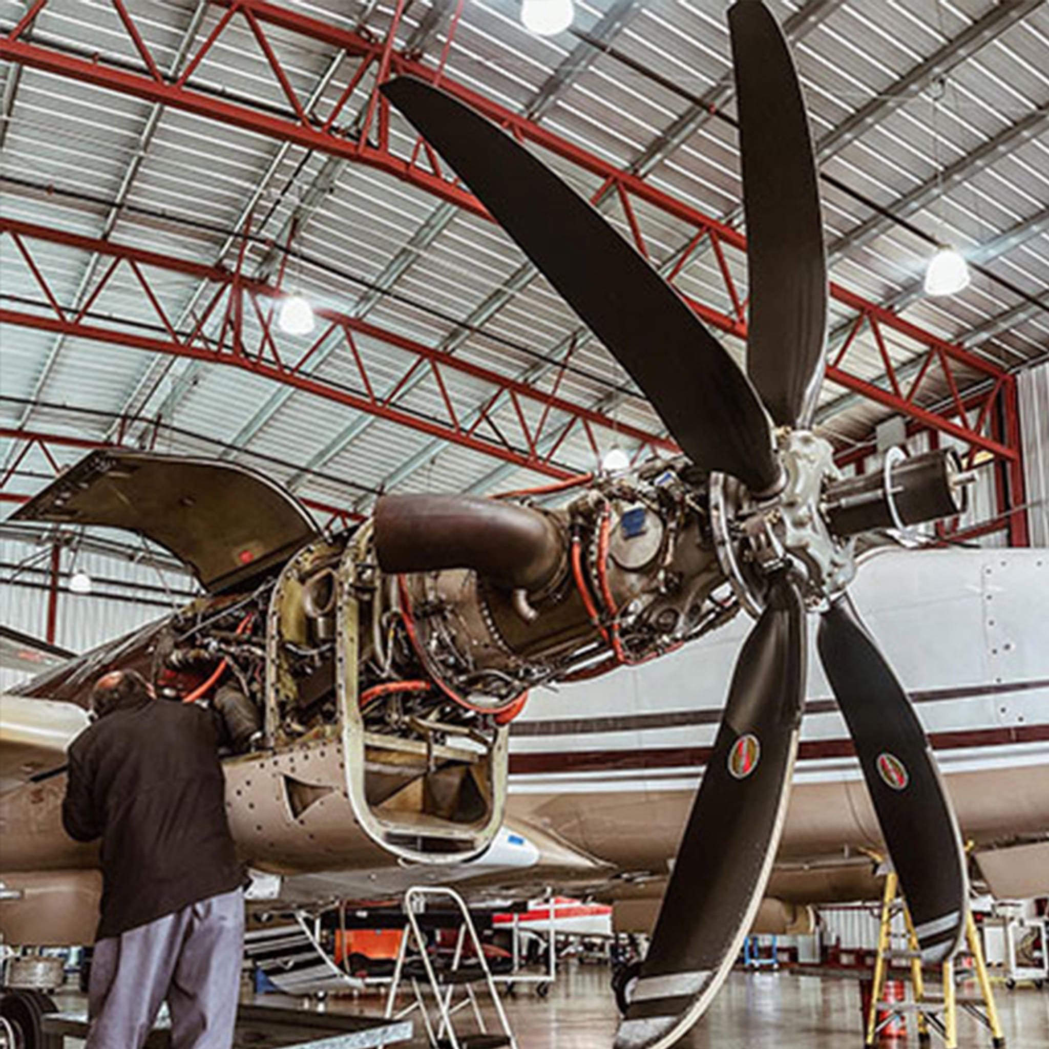A turboprop aircraft undergoing scheduled maintenance