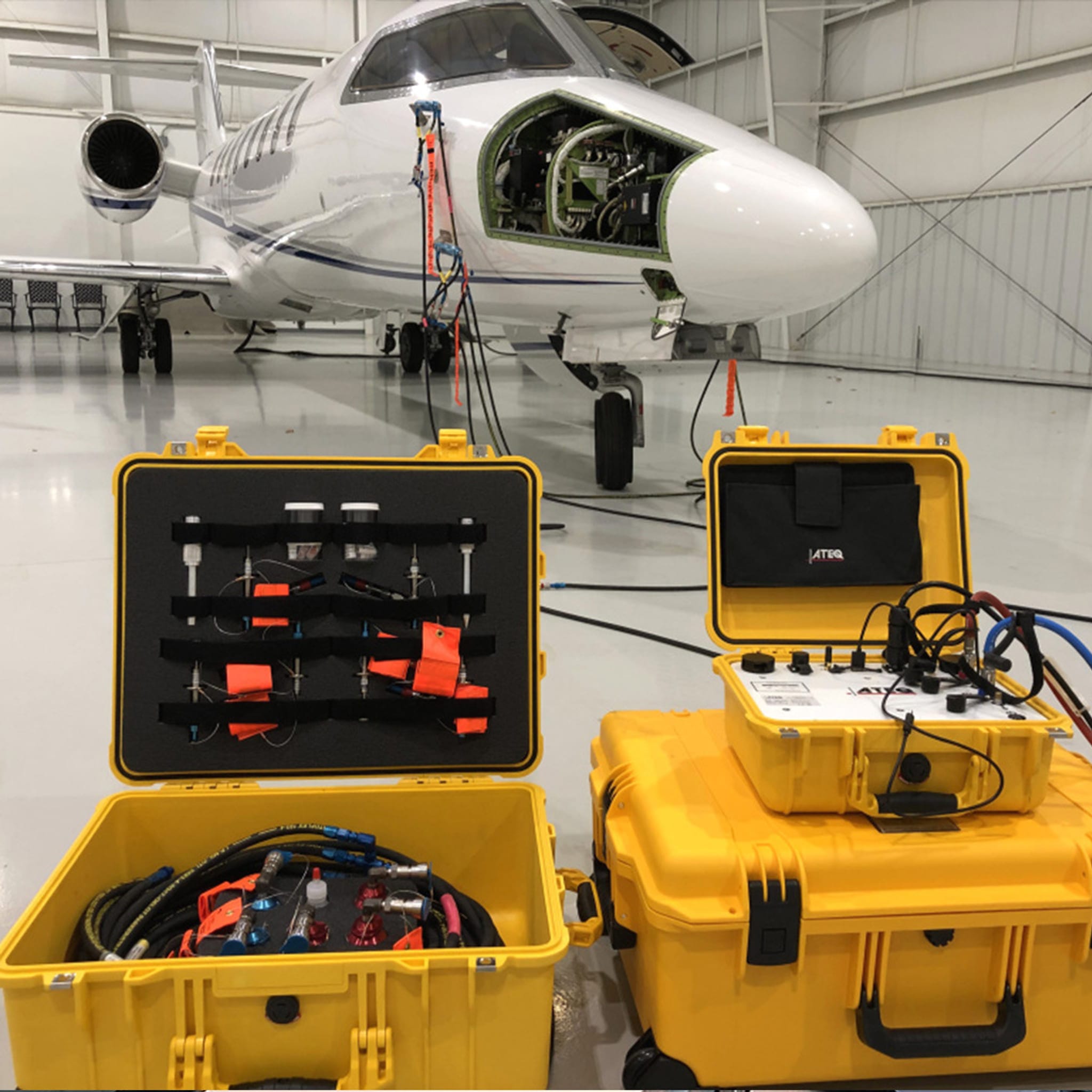Pitot-static system testing equipment connected to an aircraft