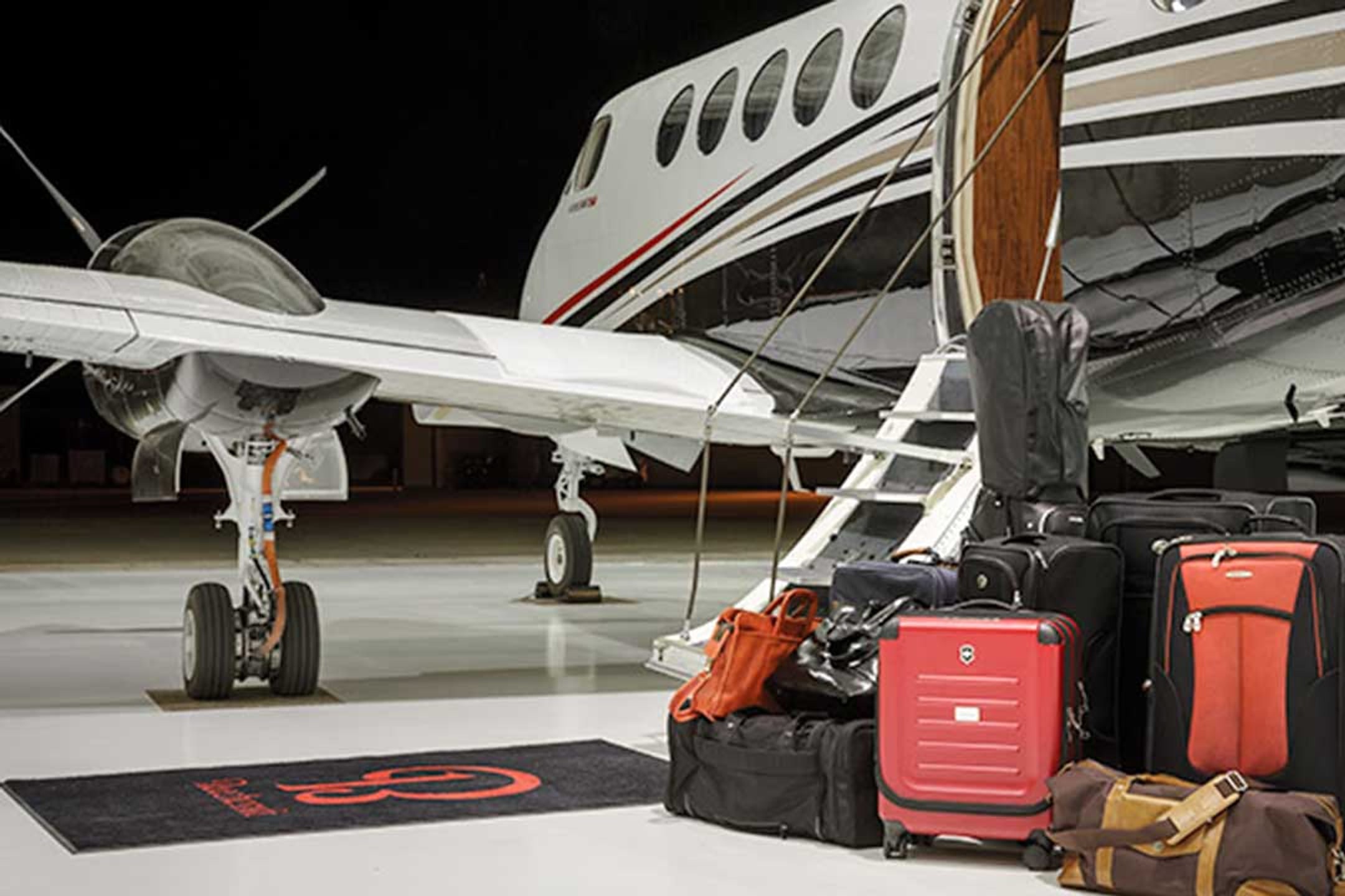 Passengers boarding a King Air 350 via the airstair door