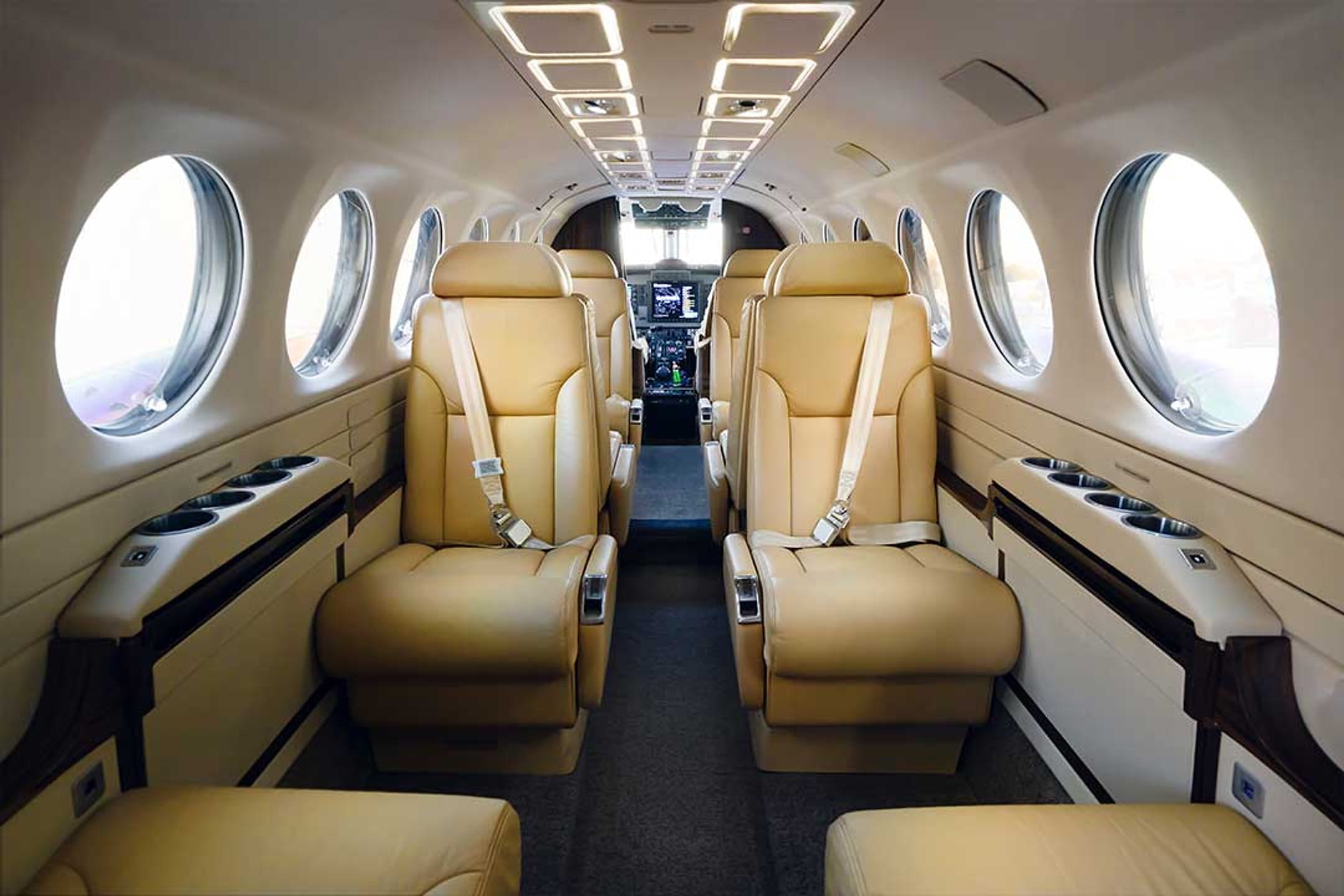 Leather seating in the King Air 350 charter cabin